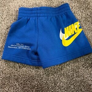 Nike Royal Blue Shorts with Yellow Swoosh
